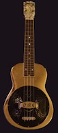ukulele with black cover plate